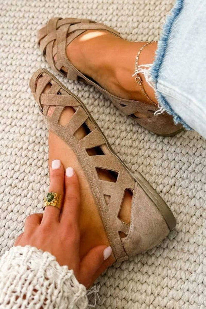 HINA | Flat sandals with open toes and woven material
